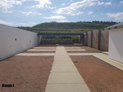 Range E seen from the firing line, looking down the walkway to the target line