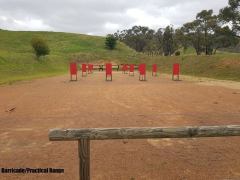 Red target stands on the Barricade and Practical range