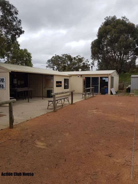 Exterior of the Action club house with its covered veranda